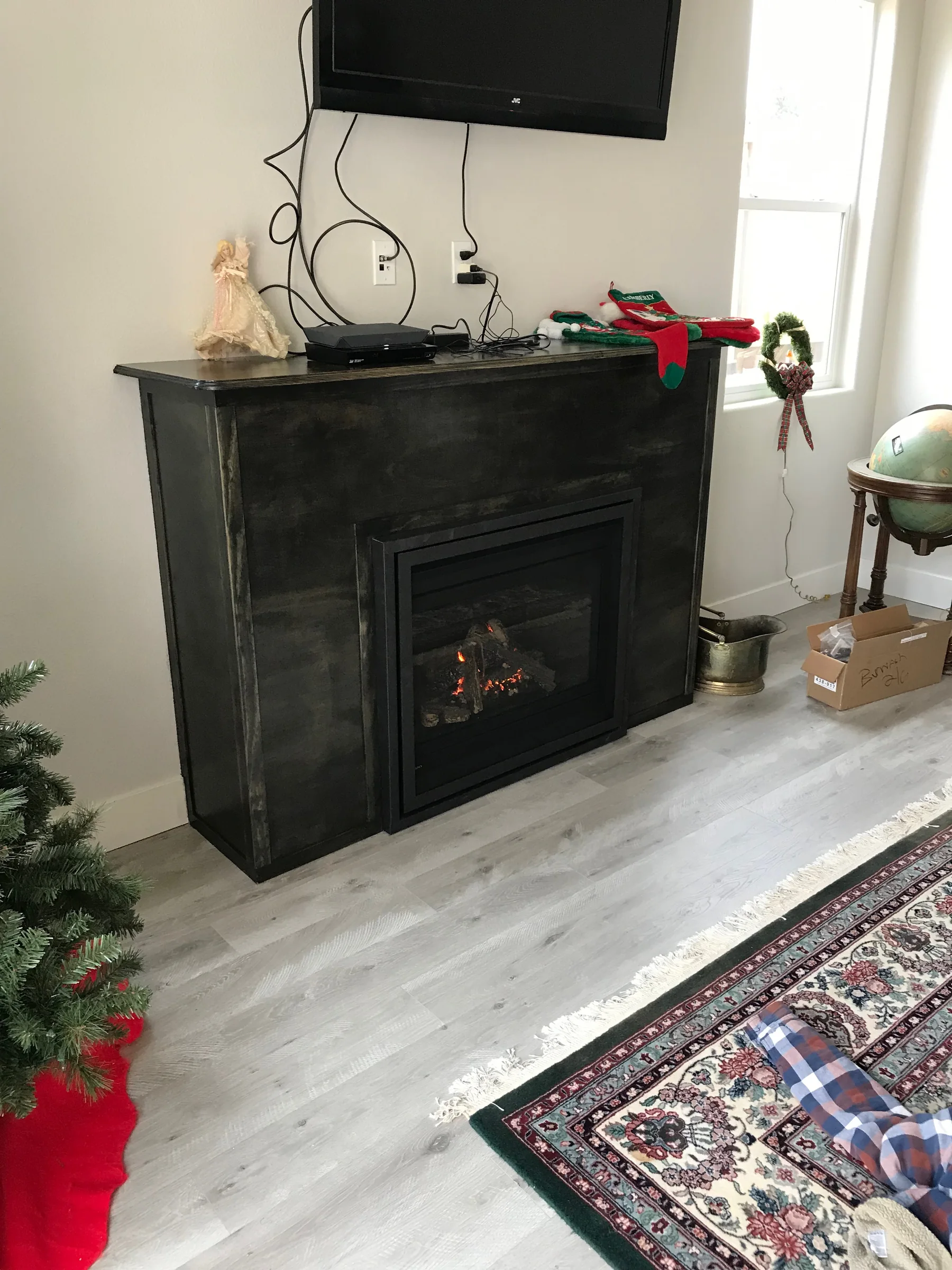 Custom dark stone fireplace surround